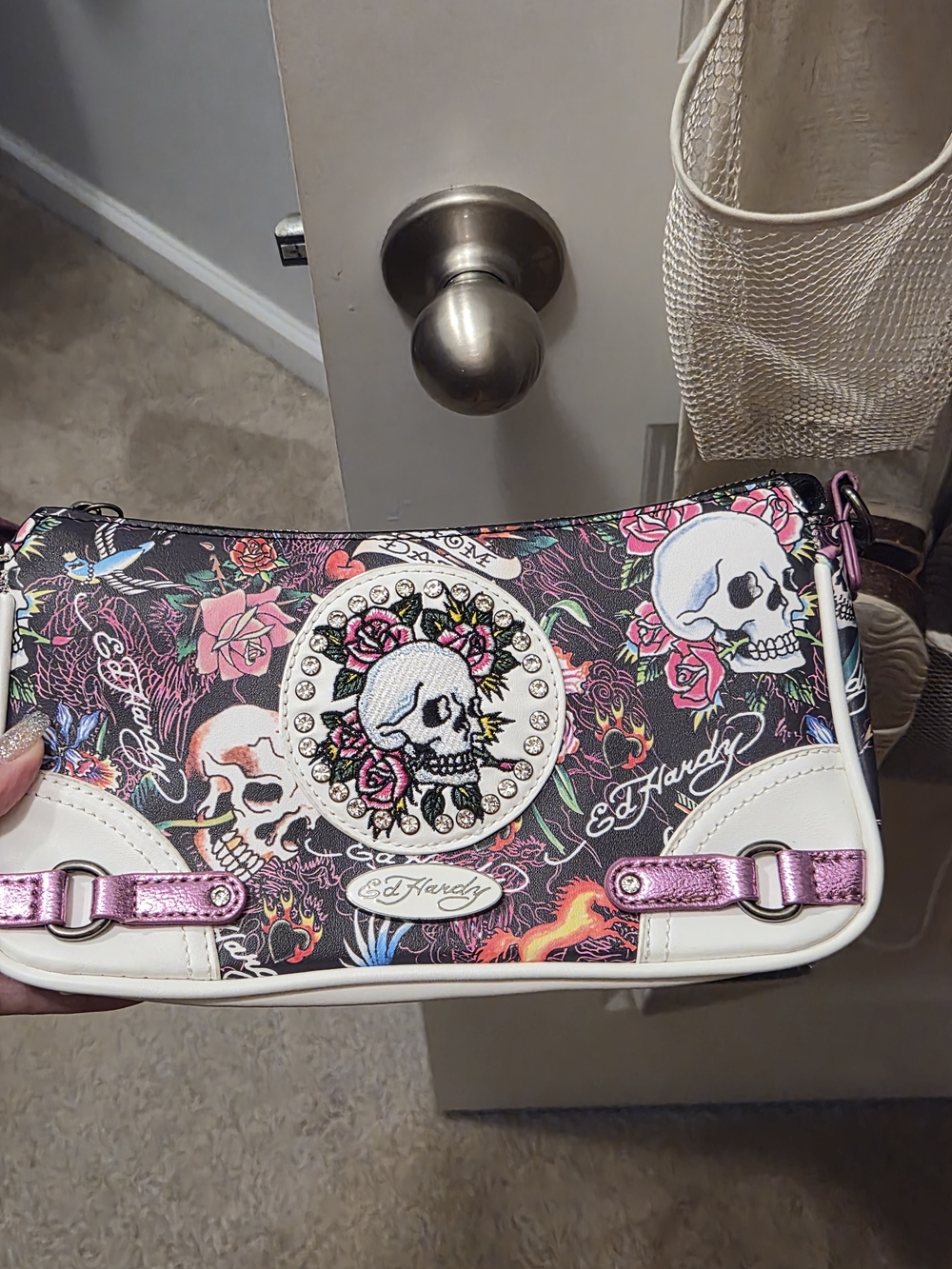 Ed Hardy Black Floral Skull Wristlet with Pink Metallic Accents